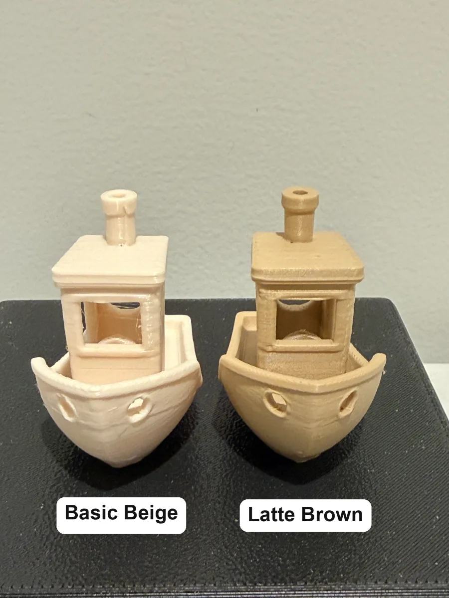 Bambu Lab PLA Basic Beige next to PLA Matte Latte Brown, printed samples