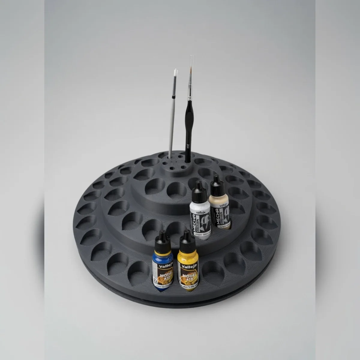 Rotating paint carousel for 57 dropper bottles