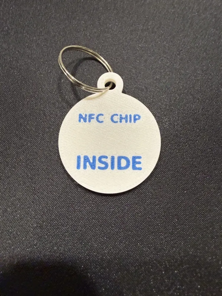 Back of the BUDDY pet tag printed with NFC CHIP INSIDE